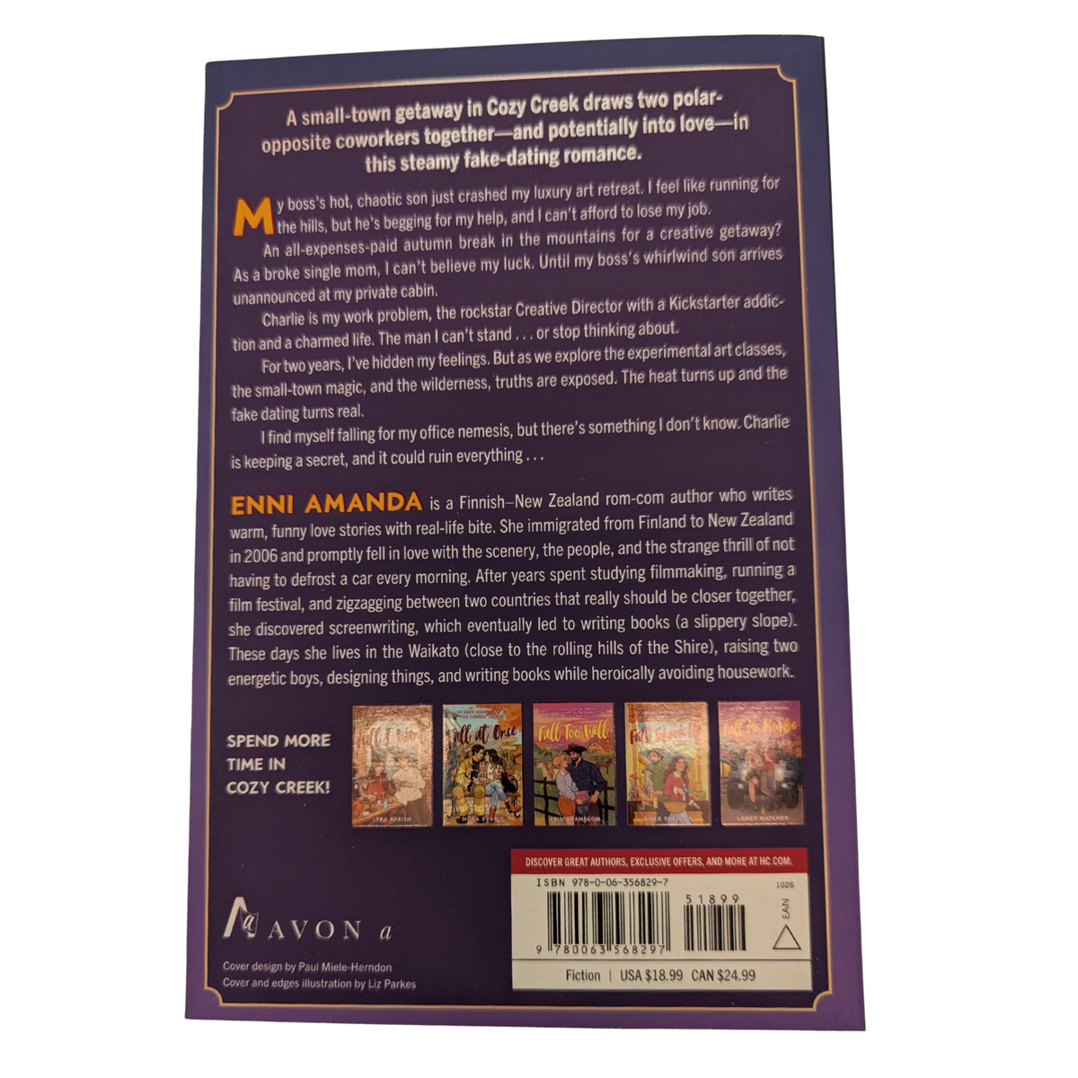 Falling Slowly by Enni Amanda paperback cozy autumn romance book cover featuring an illustrated couple relaxing together on a couch