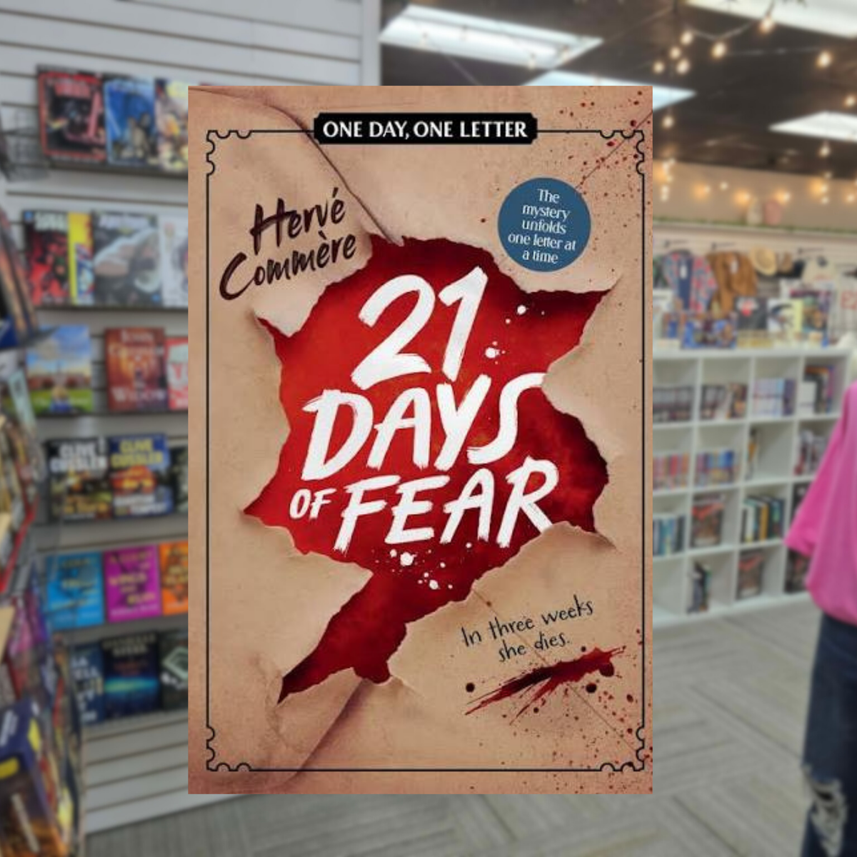 21 Days of Fear by Hervé Commère mystery thriller book cover featuring torn beige paper revealing a blood-red background, bold white lettering, and the tagline One Day One Letter