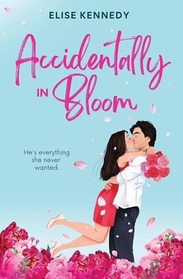 Accidentally in Bloom by Elise Kennedy paperback romance book featuring a couple kissing surrounded by pink flowers.