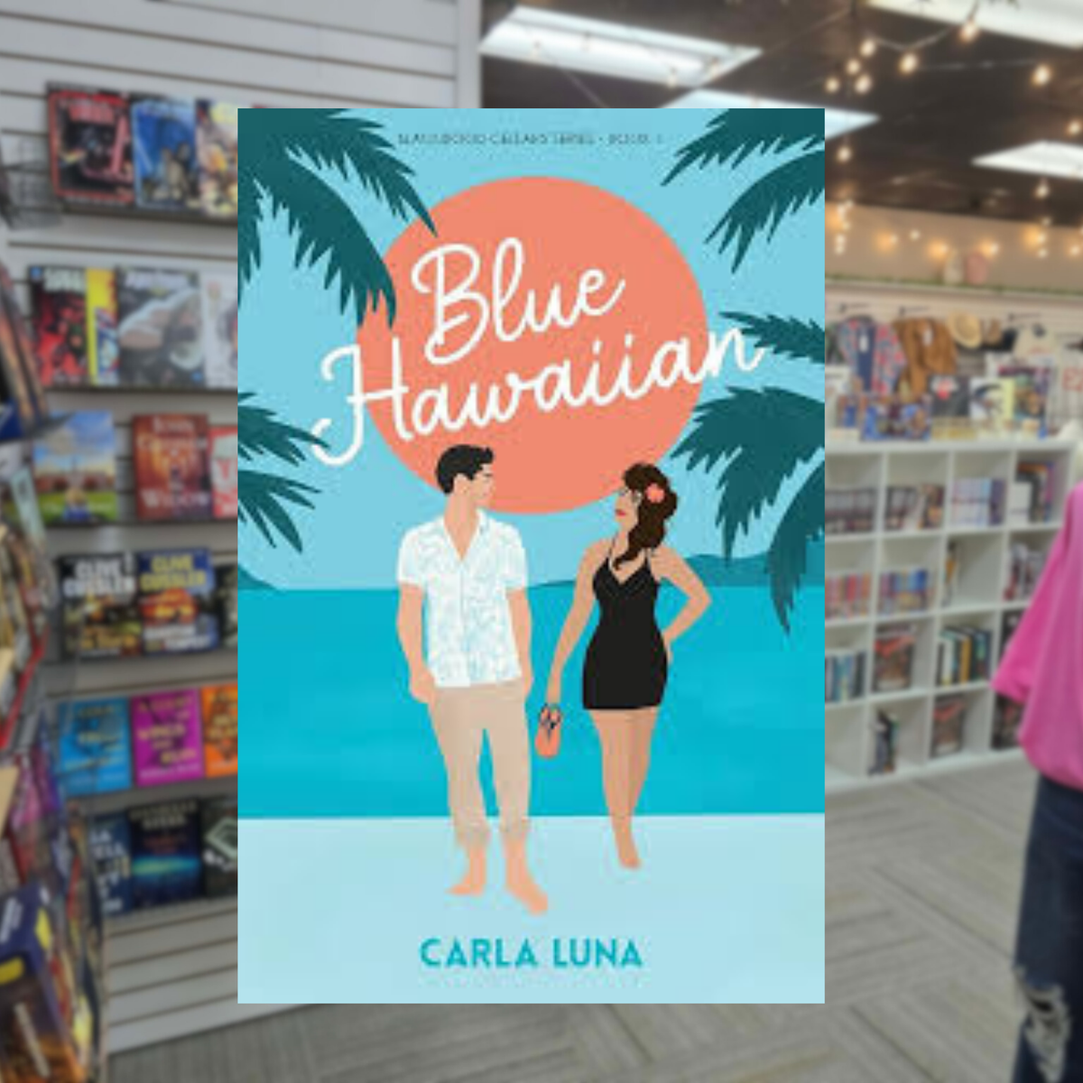 Blue Hawaiian by Carla Luna paperback romance book cover featuring an illustrated couple on a tropical Hawaiian beach with palm trees, turquoise water, and a pink sunset.