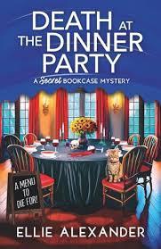 Death at the Dinner Party by Ellie Alexander cozy mystery paperback cover featuring an elegant dining room with a beautifully set table, red curtains, and a mysterious atmosphere.