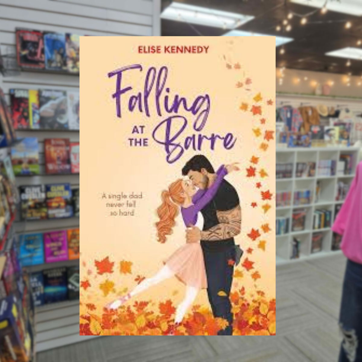 Falling at the Barre by Elise Kennedy romance book cover featuring an illustrated couple embracing among colorful autumn leaves against a warm peach background.