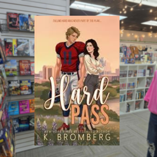 Hard Pass by K. Bromberg sports romance book cover featuring an illustrated blond football player in a red jersey standing beside a brunette woman against a city skyline.