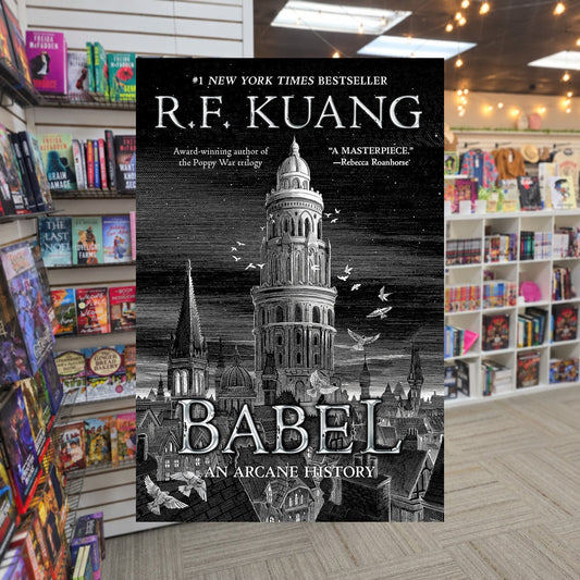 Babel by R.F. Kuang — actual cover on The Perk bookstore background