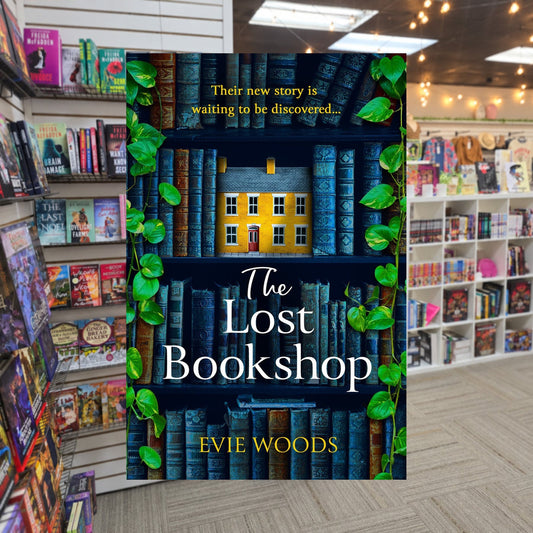 The Lost Bookshop by Evie Woods — actual cover on The Perk bookstore background