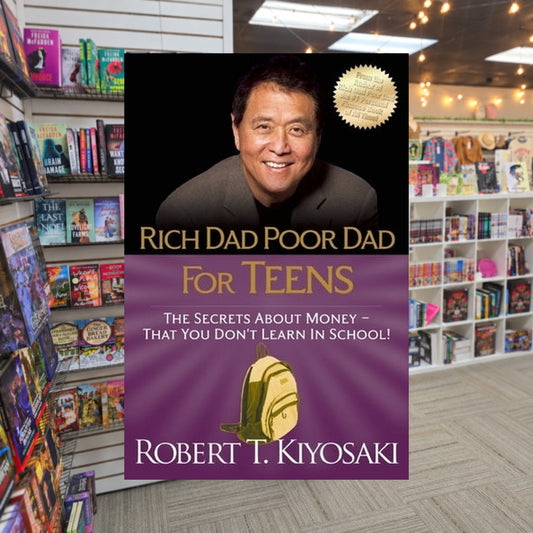 Rich Dad Poor Dad for Teens: The Secrets about Money--That You Don't Learn in School! by Robert T. Kiyosaki — actual cover on The Perk bookstore background
