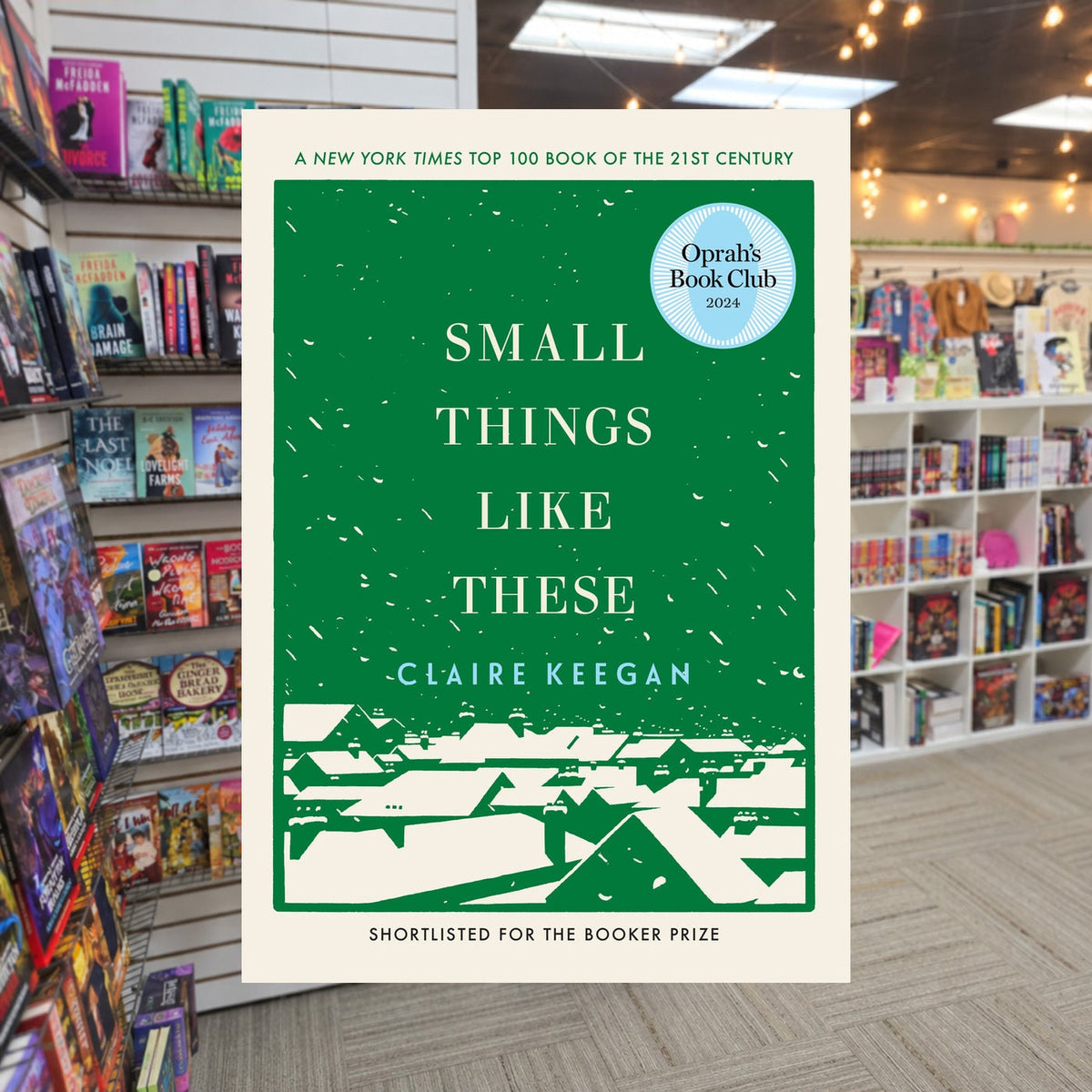 Small Things Like These by Claire Keegan — actual cover on The Perk bookstore background
