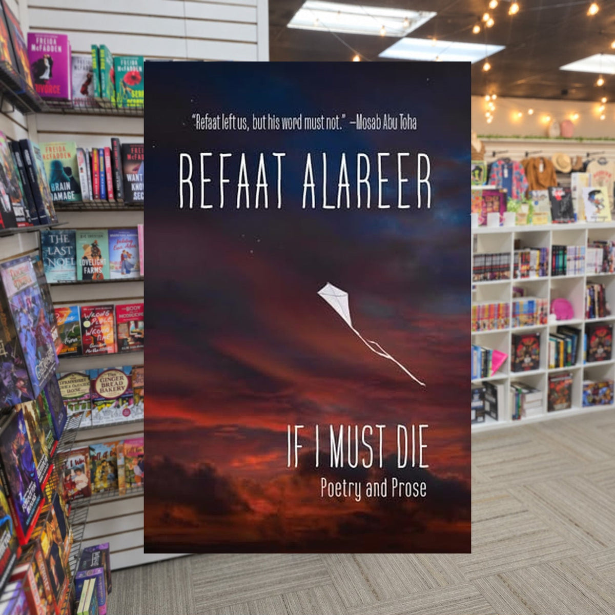 If I Must Die: Poetry and Prose by Refaat Alareer — actual cover on The Perk bookstore background