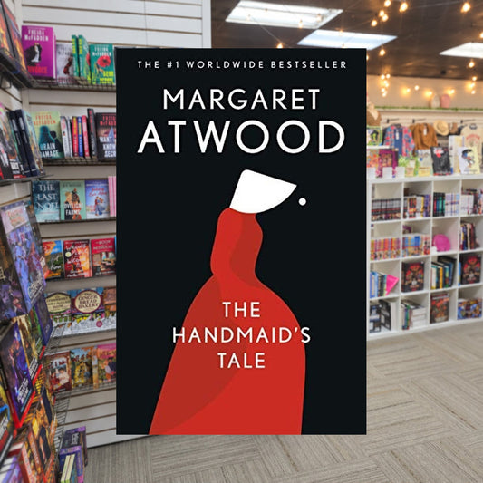 The Handmaid's Tale by Margaret Atwood — actual cover on The Perk bookstore background