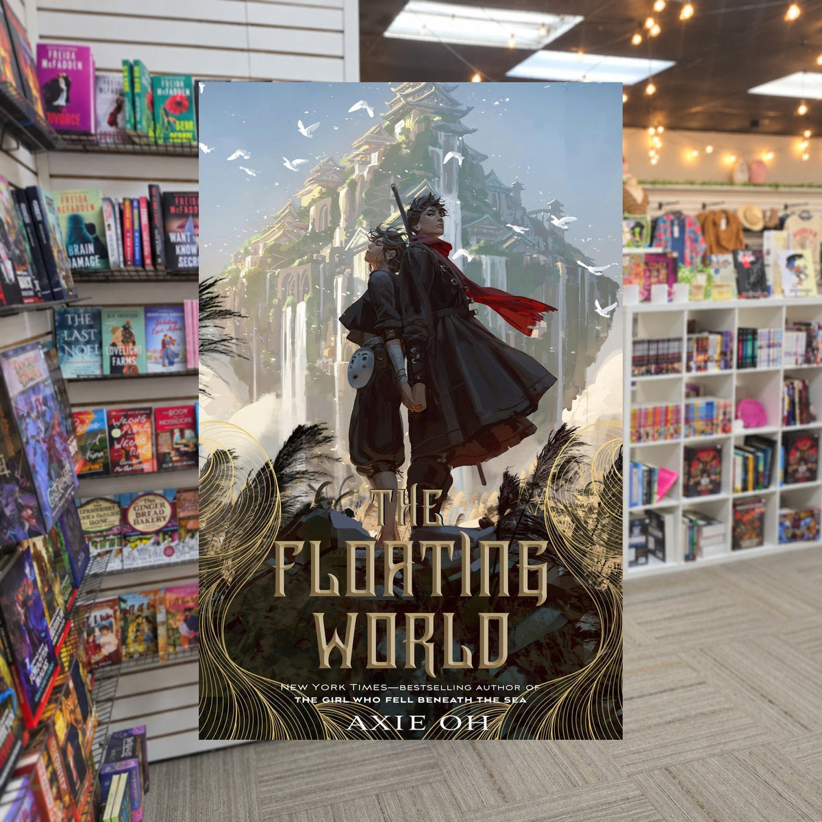The Floating World #1: The Floating World by Axie Oh — actual cover on The Perk bookstore background