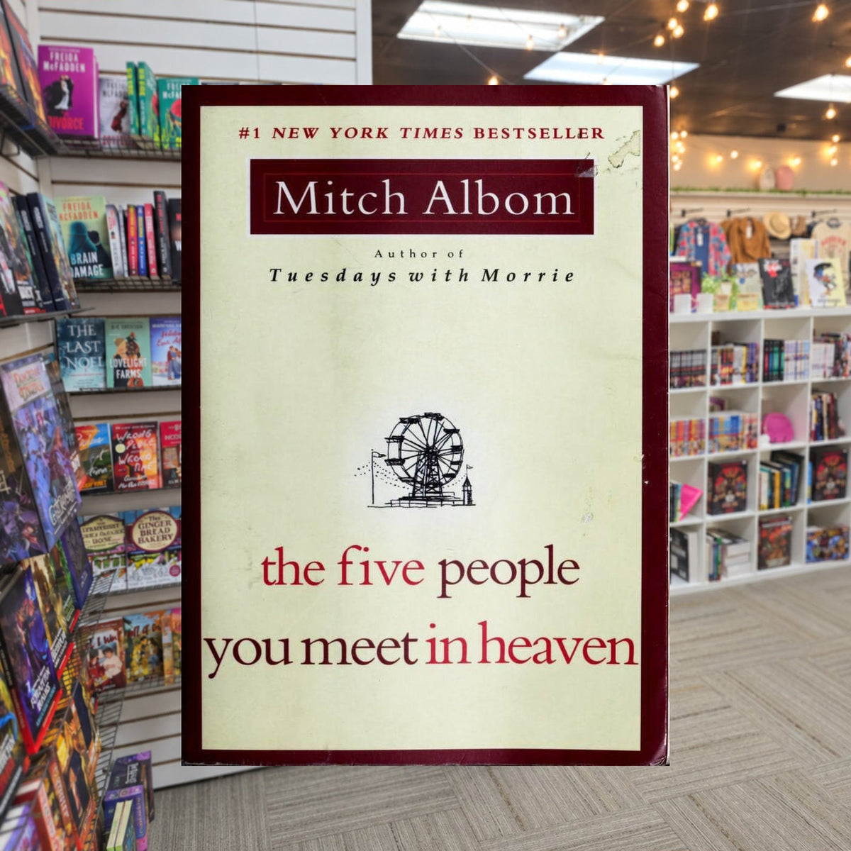 The Five People You Meet In Heaven - Mitch Albom — actual cover on The Perk bookstore background
