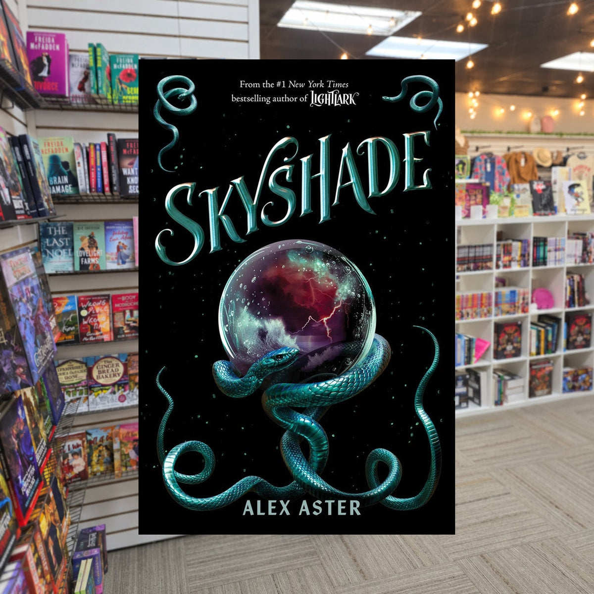 Lightlark #3: Skyshade by Alex Aster — actual cover on The Perk bookstore background