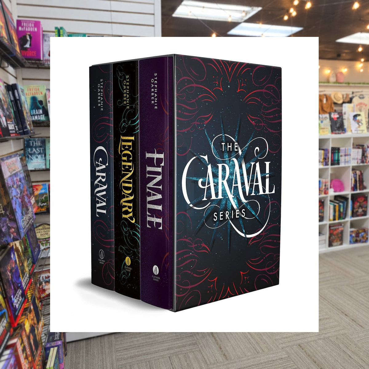 Caraval #1-3 Caraval Paperback Boxed Set: Caraval, Legendary, Finale by Stephanie Garber — actual cover on The Perk bookstore background