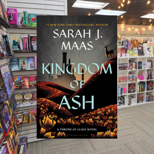 Kingdom of Ash by Sarah J. Maas — actual cover on The Perk bookstore background