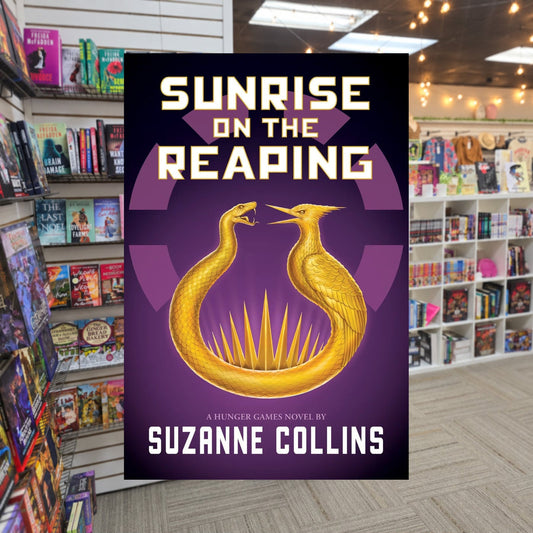 The Hunger Games: Sunrise on the Reaping by Suzanne Collins — actual cover on The Perk bookstore background