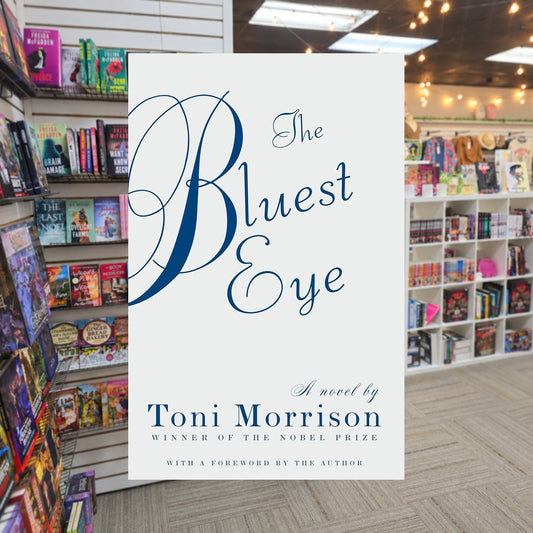 The Bluest Eye — actual cover on The Perk bookstore background