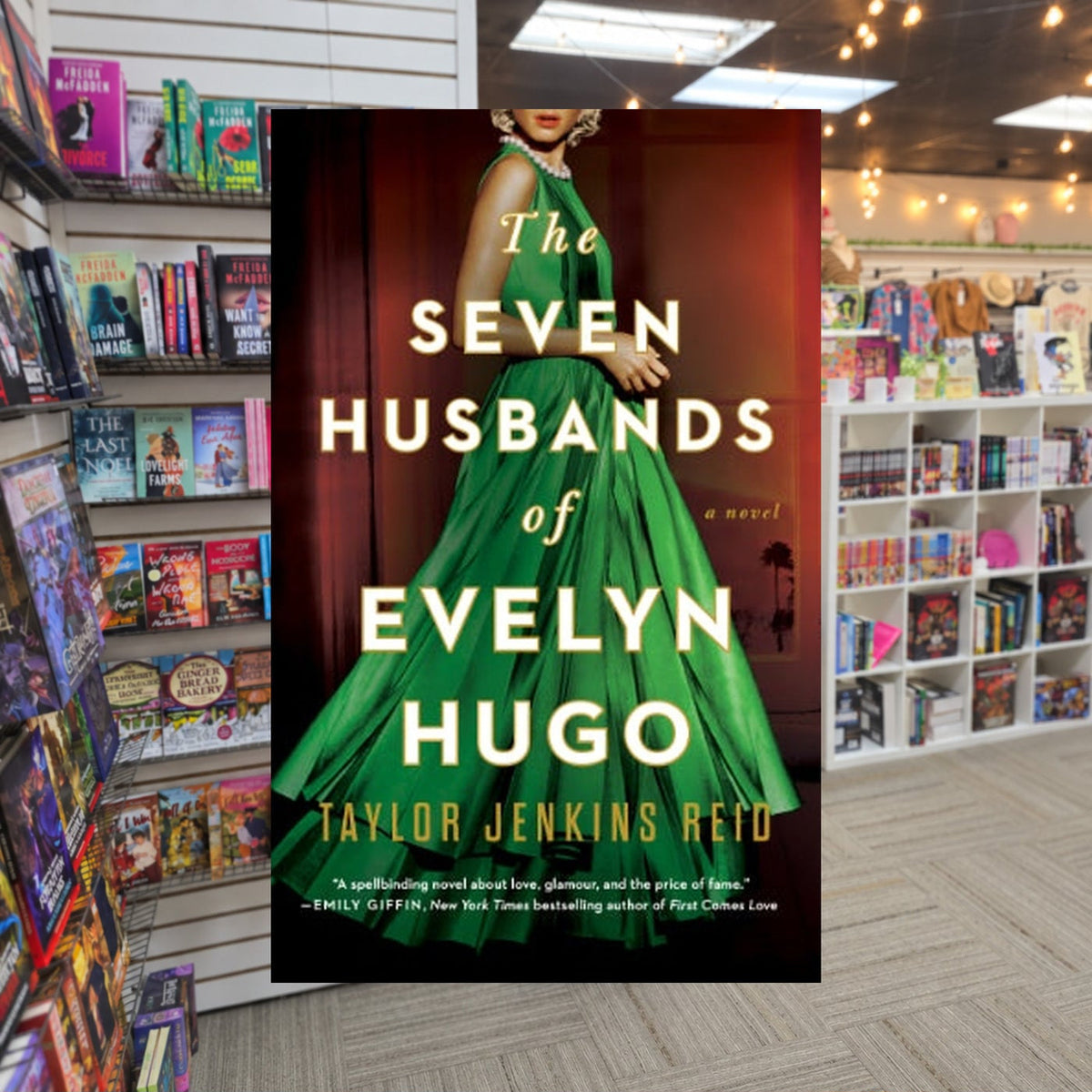 The Seven Husbands of Evelyn Hugo by Taylor Jenkins Reid — actual cover on The Perk bookstore background