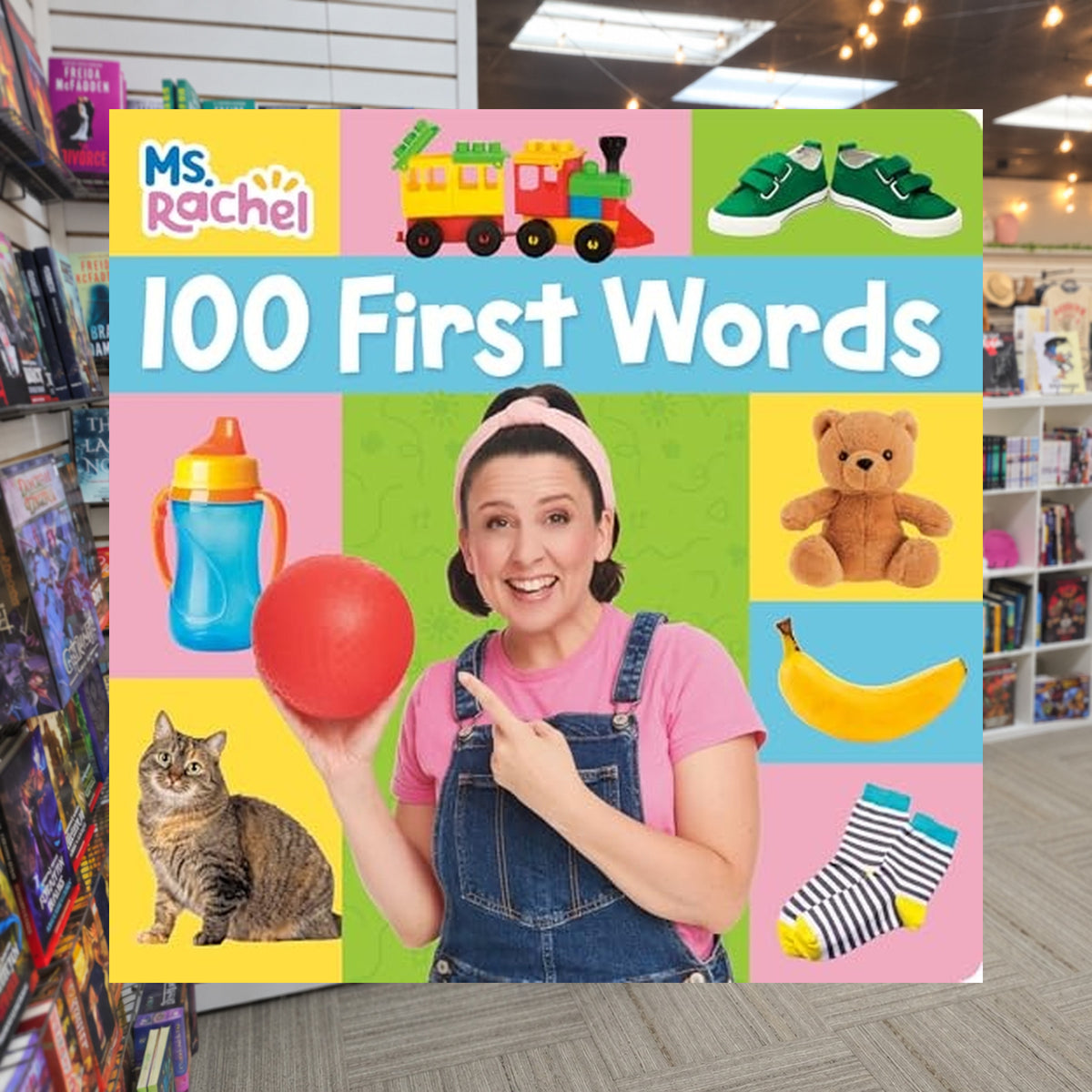 100 First Words (Ms. Rachel) by Ms. Rachel — actual cover on The Perk bookstore background