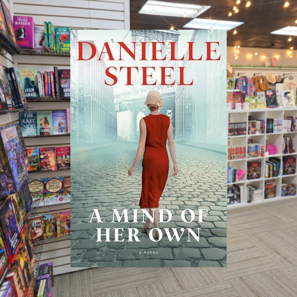 A Mind of Her Own by Danielle Steel — actual cover on The Perk bookstore background