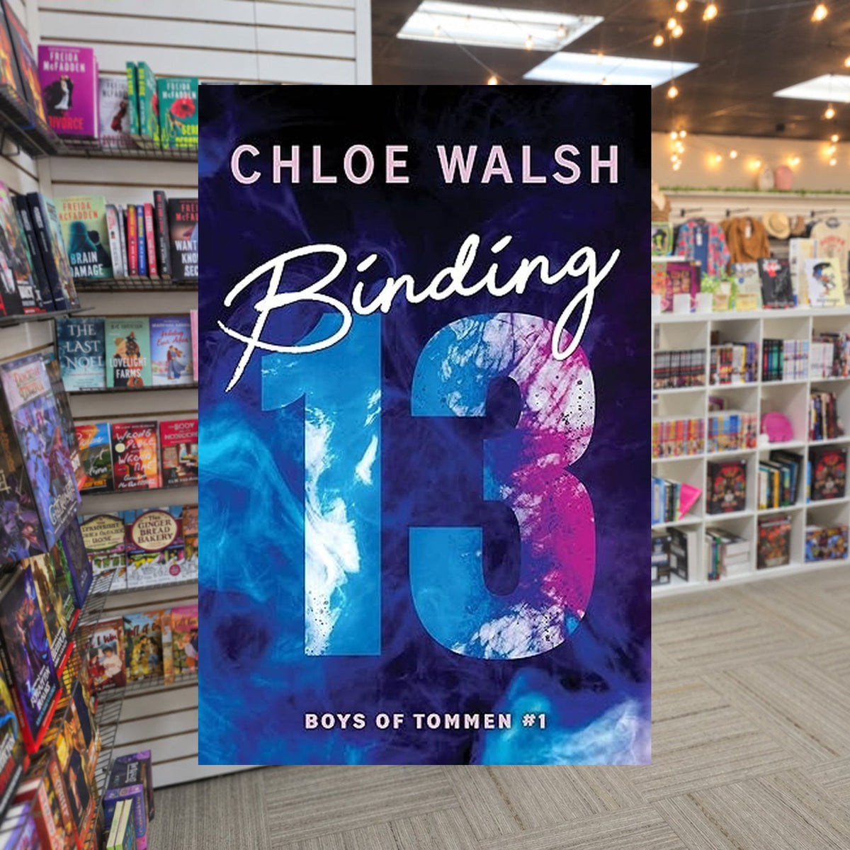 Boys of Tommen #1: Binding 13 by Chloe Walsh — actual cover on The Perk bookstore background