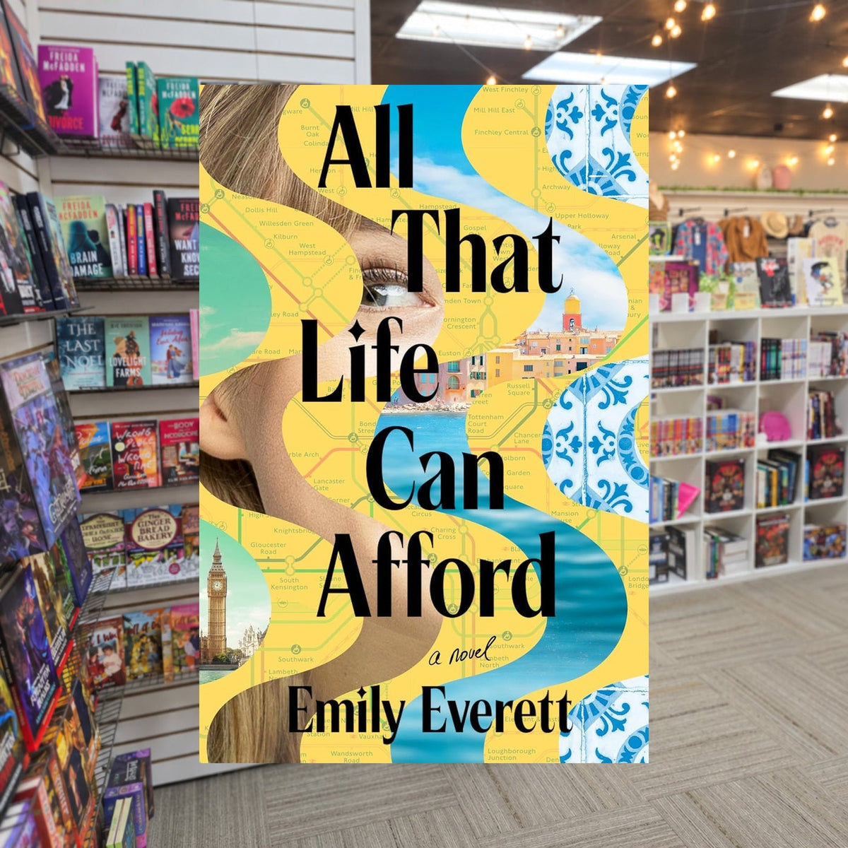 All That Life Can Afford by Emily Everett — actual cover on The Perk bookstore background