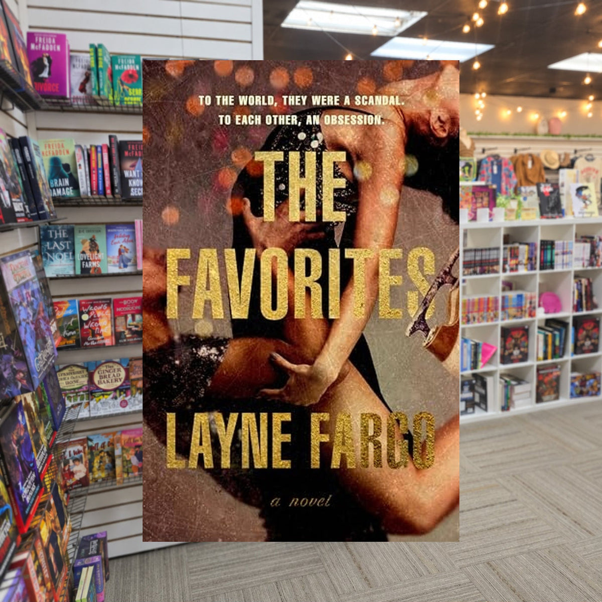 The Favorites by Layne Fargo — actual cover on The Perk bookstore background