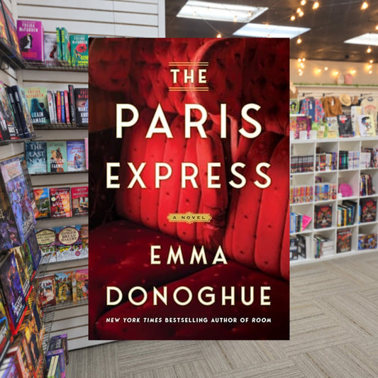The Paris Express by Emma Donoghue — actual cover on The Perk bookstore background