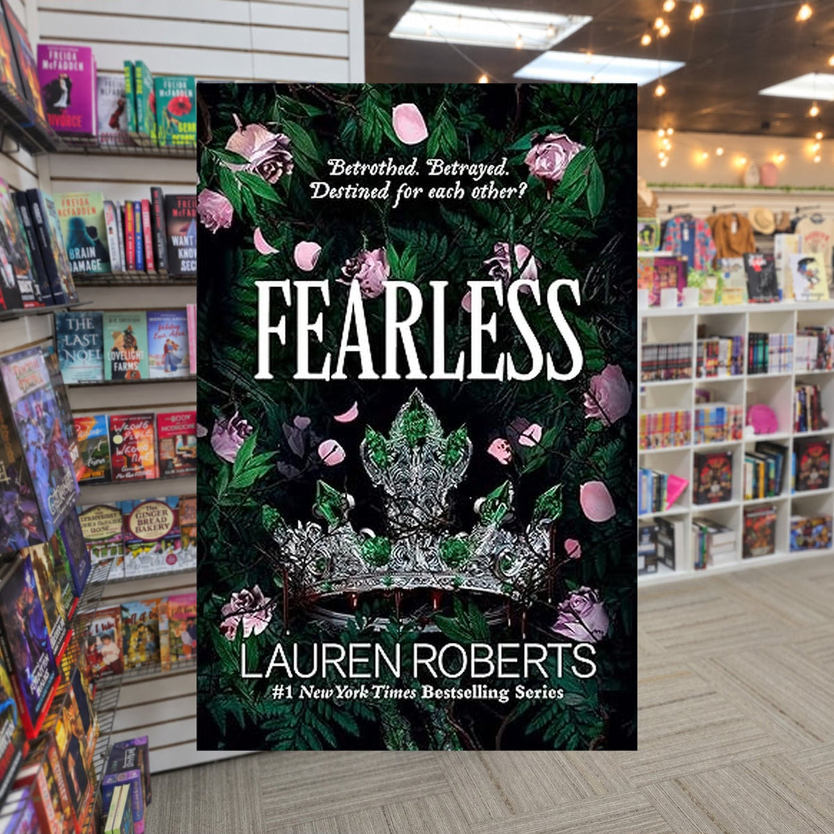 The Powerless Trilogy #3: Fearless by Lauren Roberts — actual cover on The Perk bookstore background