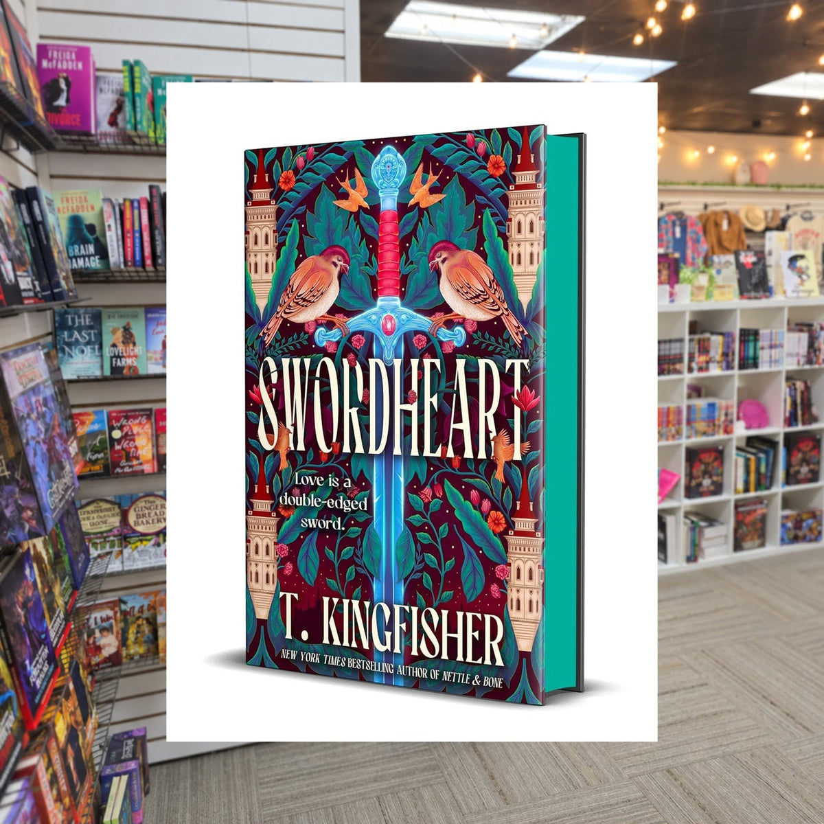 Swordheart by T. Kingfisher — actual cover on The Perk bookstore background