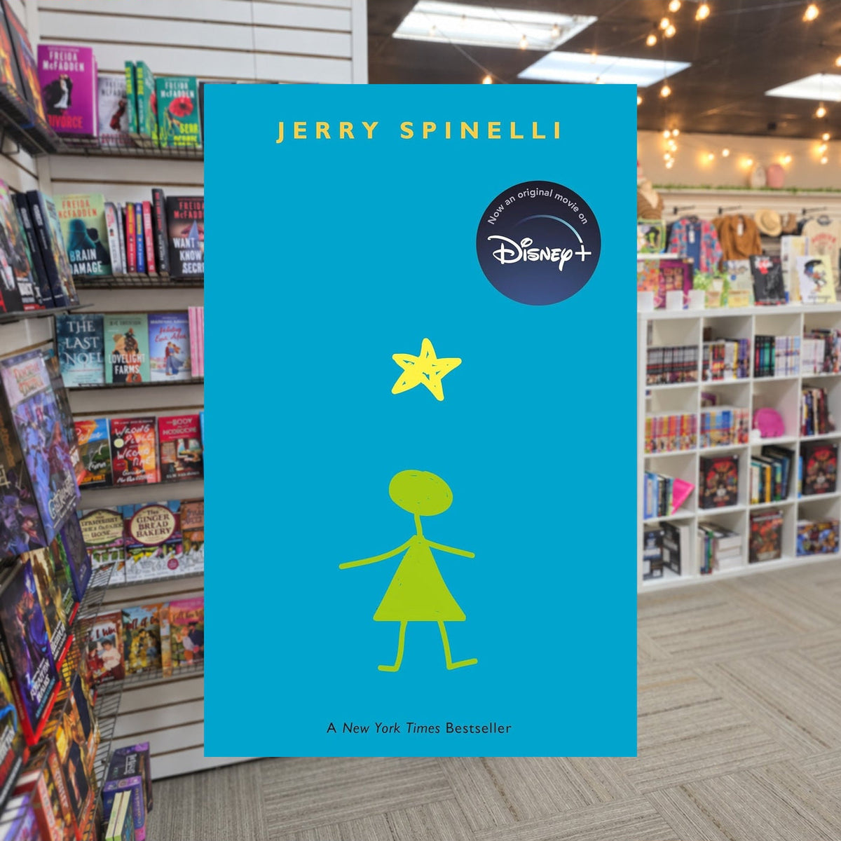 Stargirl #1: Stargirl by Jerry Spinelli — actual cover on The Perk bookstore background