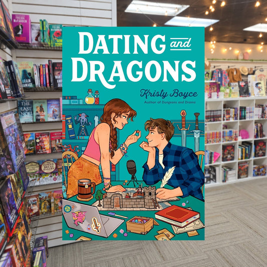 Dating and Dragons by Kristy Boyce — actual cover on The Perk bookstore background