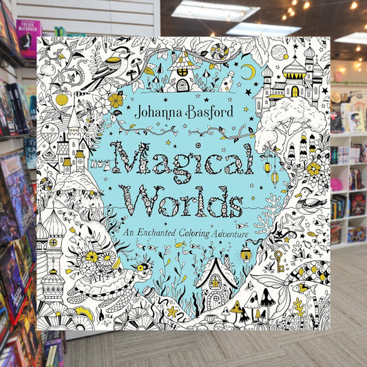Magical Worlds: An Enchanted Coloring Adventure by Johanna Basford — actual cover on The Perk bookstore background