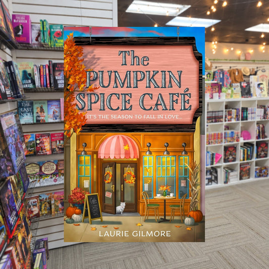 The Pumpkin Spice Café by Laurie Gilmore — actual cover on The Perk bookstore background