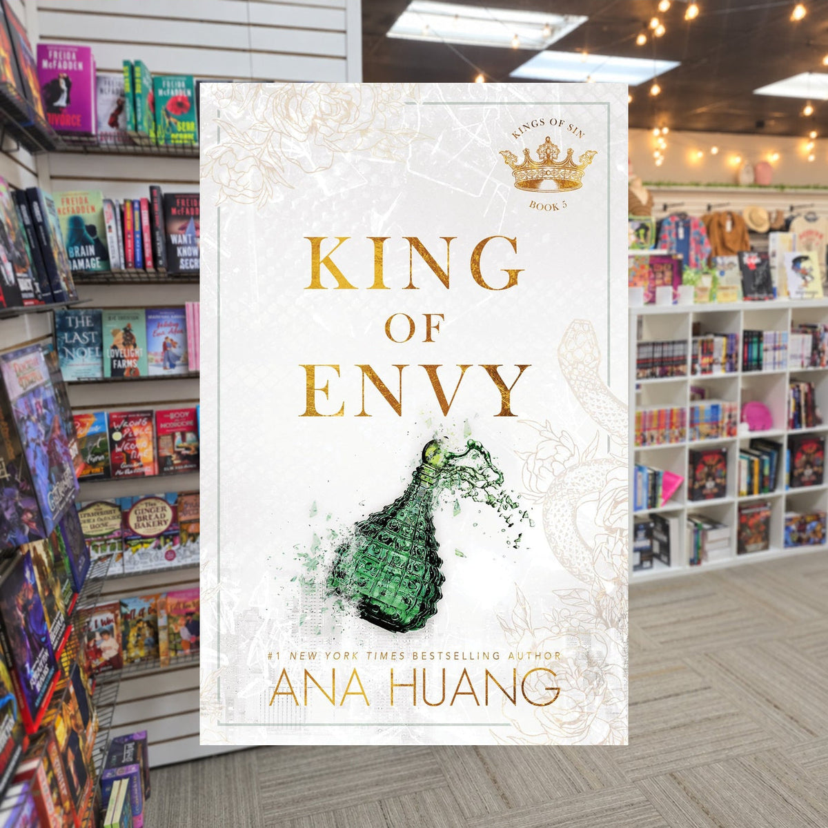 King of Envy by Ana Huang — actual cover on The Perk bookstore background