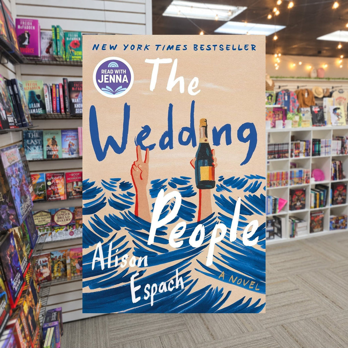 The Wedding People by Alison Espach — actual cover on The Perk bookstore background