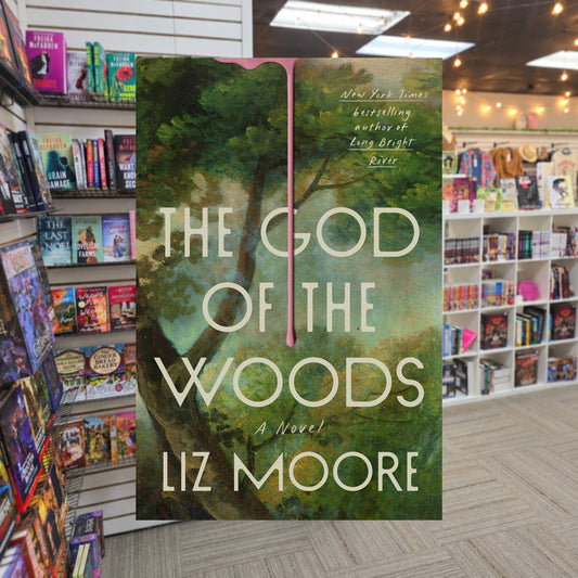 The God of the Woods by Liz Moore — actual cover on The Perk bookstore background