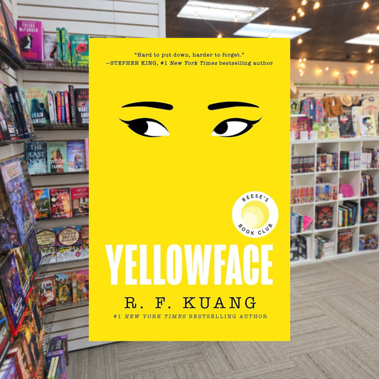 Yellowface by R.F. Kuang — actual cover on The Perk bookstore background