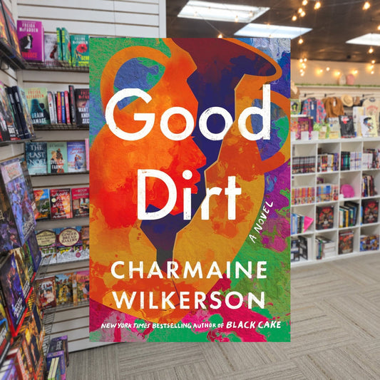 Good Dirt by Charmaine Wilkerson — actual cover on The Perk bookstore background