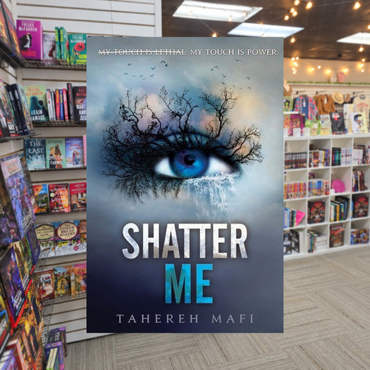 Shatter Me #1: Shatter Me by Tahereh Mafi — actual cover on The Perk bookstore background