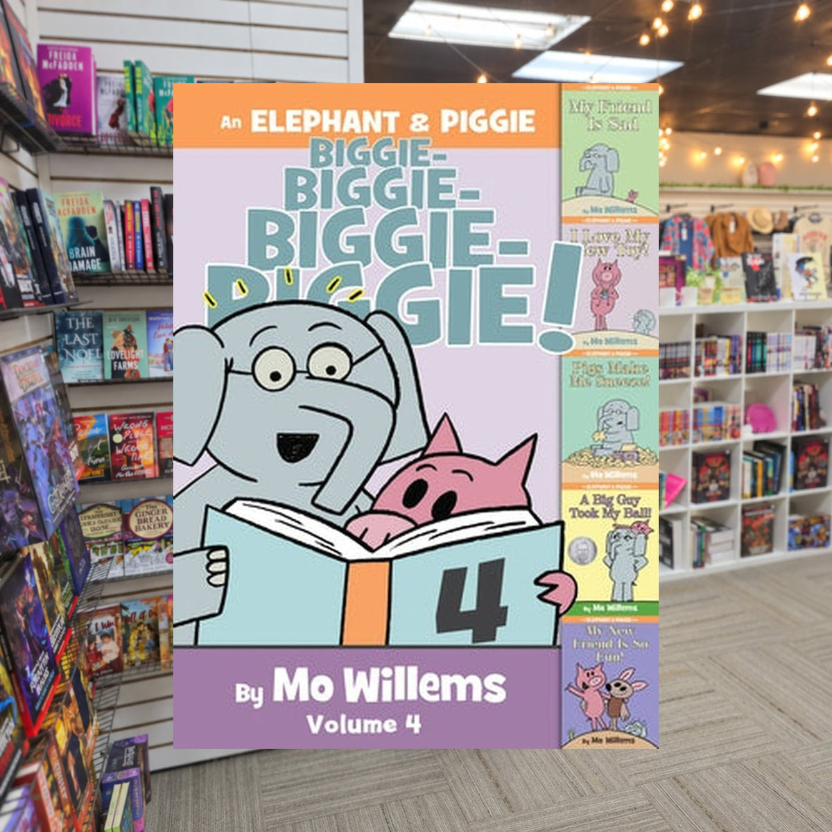 An Elephant & Piggie Biggie! Volume 4 by Mo Willems — actual cover on The Perk bookstore background