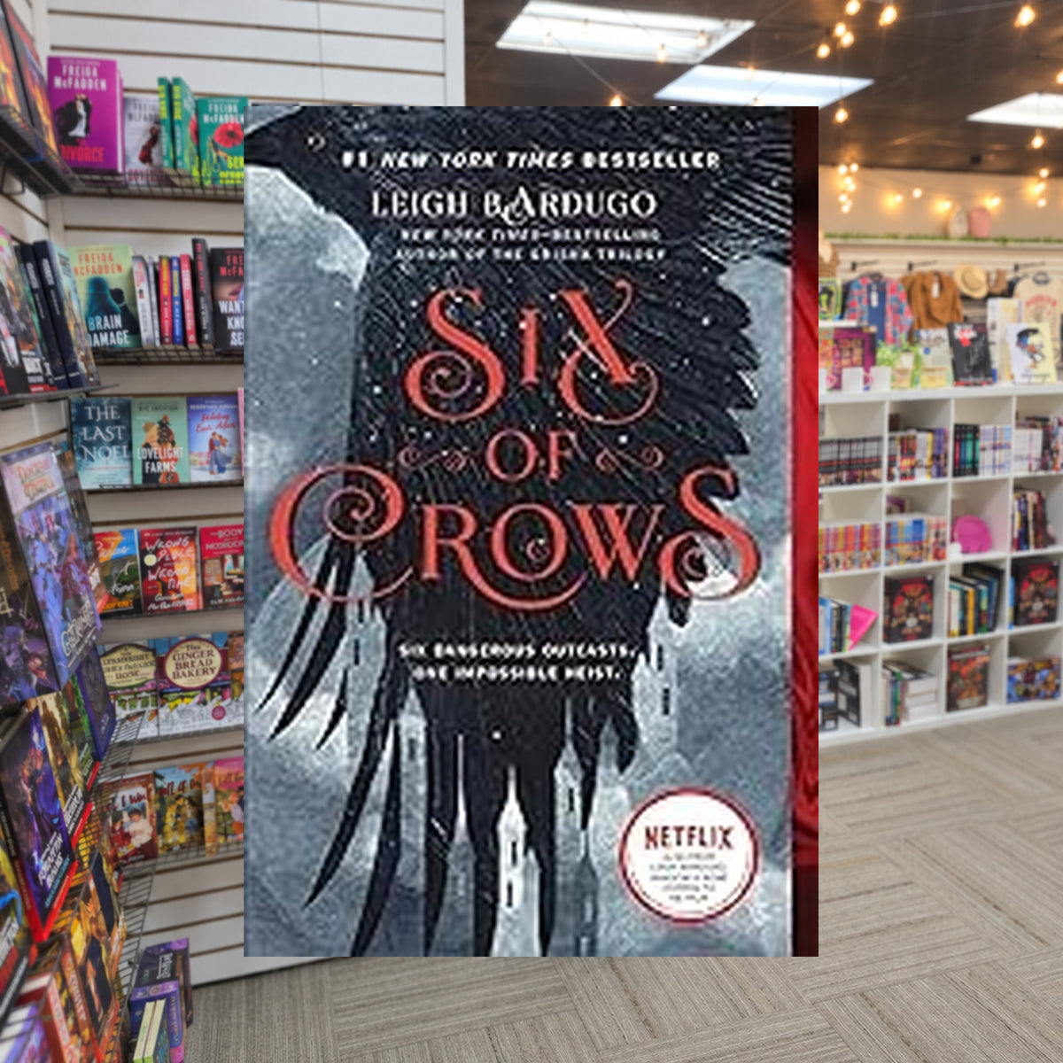 Six of Crows #1: Six of Crows by Leigh Bardugo — actual cover on The Perk bookstore background