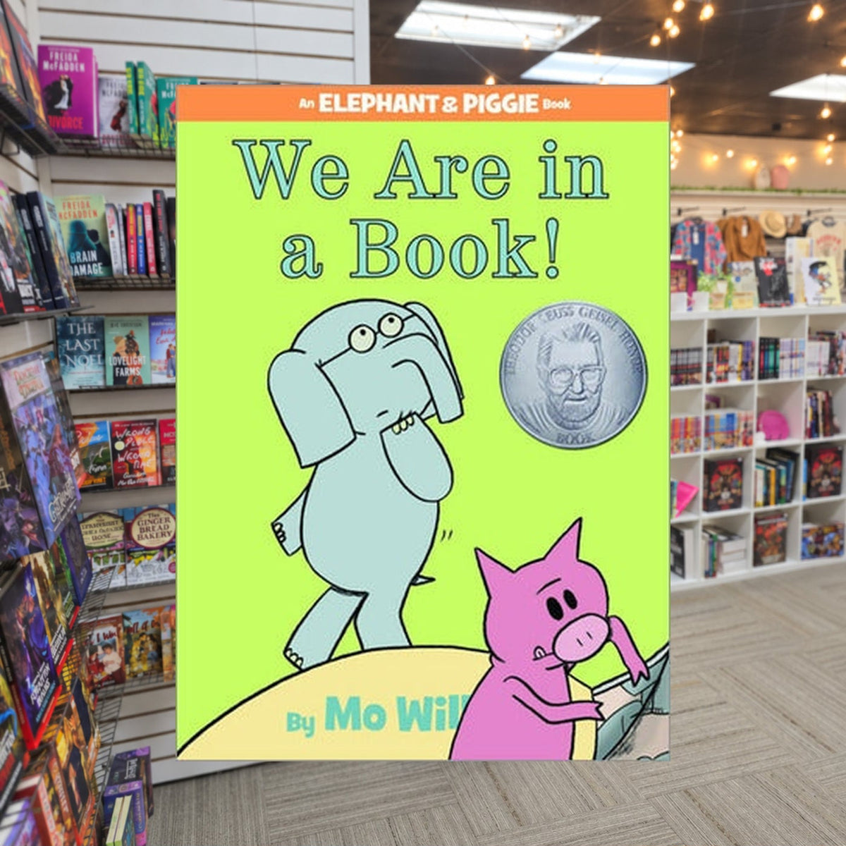 We Are in a Book! by Mo Willems — actual cover on The Perk bookstore background