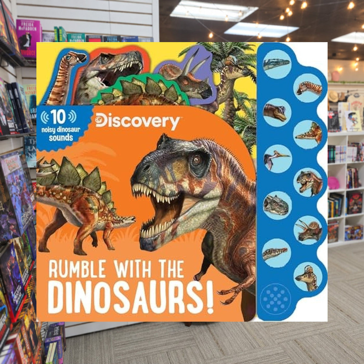 Discovery Kids: Rumble with the Dinosaurs by Thea Feldman — actual cover on The Perk bookstore background