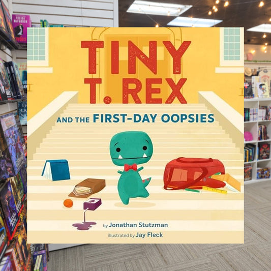 Tiny T. Rex and the First-Day Oopsies: A Back-to-School Book by Jonathan Stutzman — actual cover on The Perk bookstore background