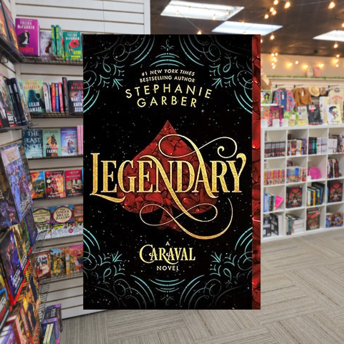 Caraval #2: Legendary by Stephanie Garber — actual cover on The Perk bookstore background