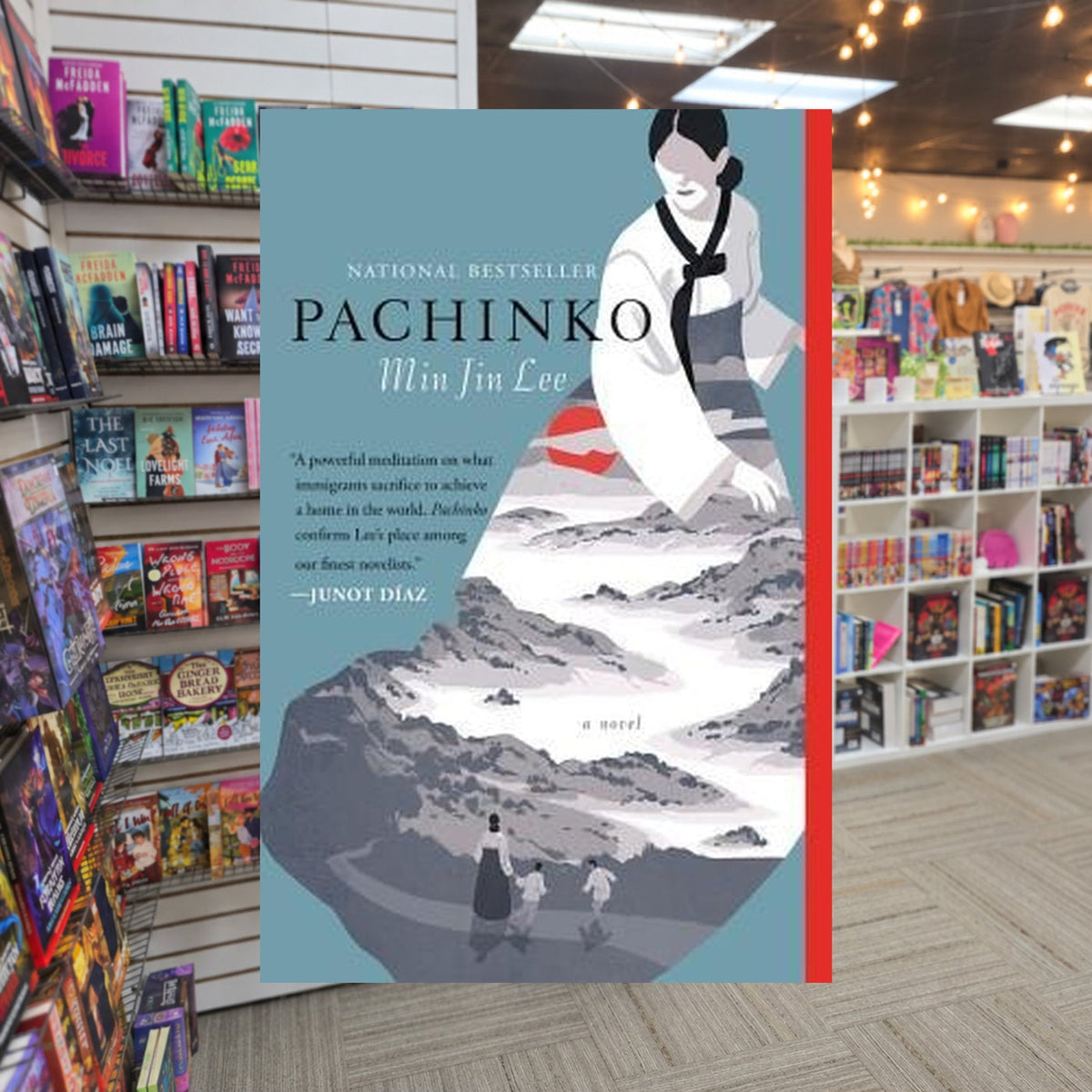 Panchinko by Min Jin Lee — actual cover on The Perk bookstore background
