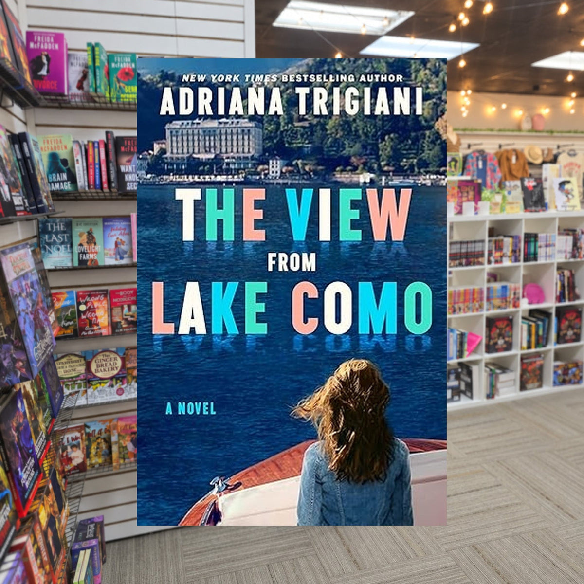 The View From Lake Como by Adriana Trigiani — actual cover on The Perk bookstore background
