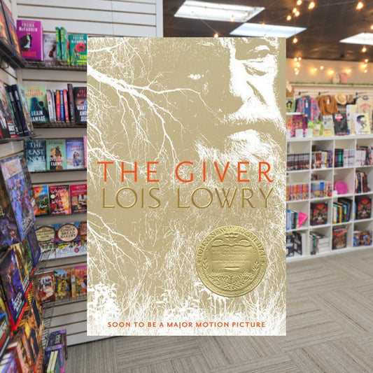 The Giver #1 The Giver by Lois Lowry — actual cover on The Perk bookstore background
