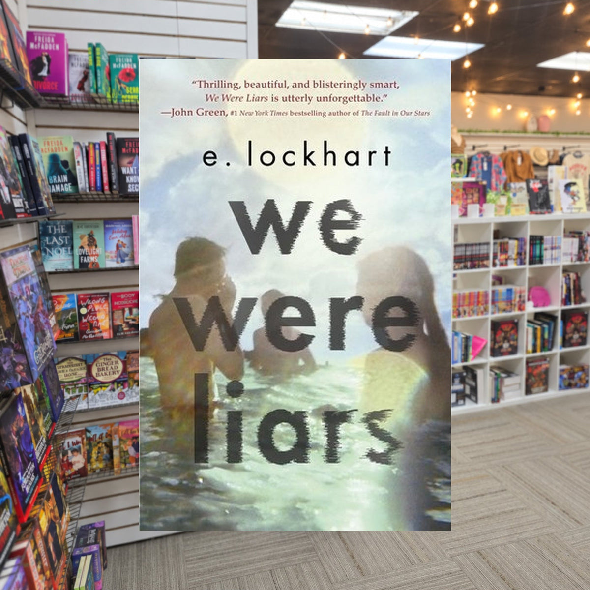 We Were Liars #1: We Were Liars by E. Lockhart — actual cover on The Perk bookstore background