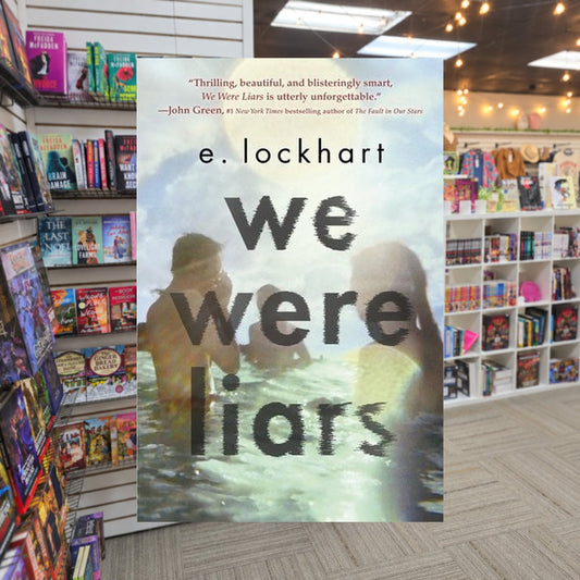 We Were Liars #1: We Were Liars by E. Lockhart — actual cover on The Perk bookstore background